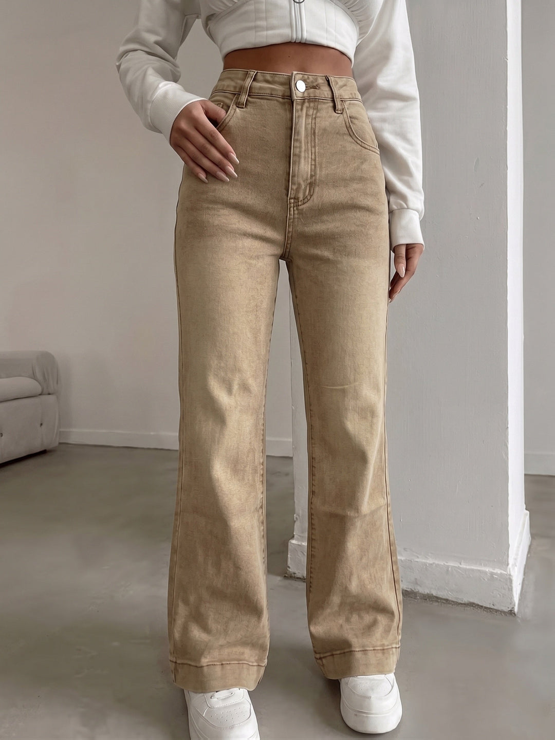 Effortless Brown Wash Flare Jeans for Women with High Waist Button Front Pocket Detail Relaxed Style