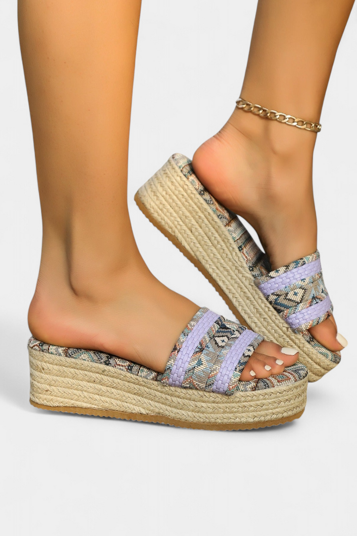Dorotea Flat sandals with double strap and ethnic woven sole