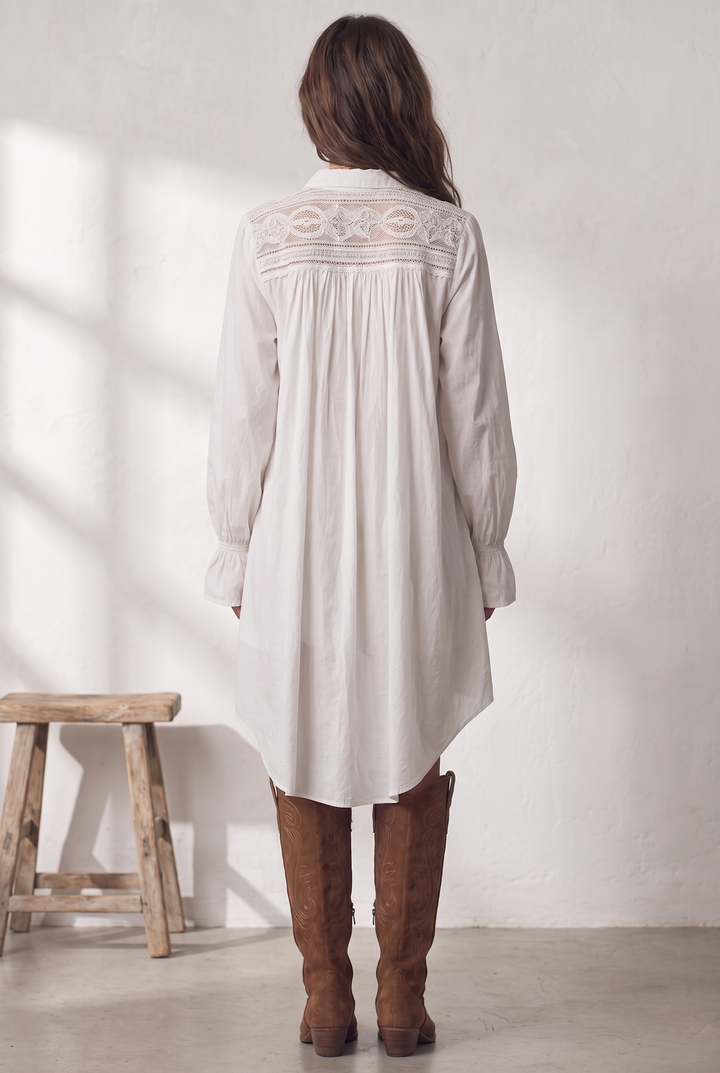 White lace mini dress with asymmetric hem and long sleeves - back view